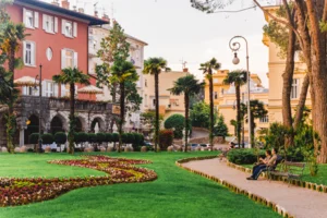 view-hotel-building-surrounded-with-palm-trees