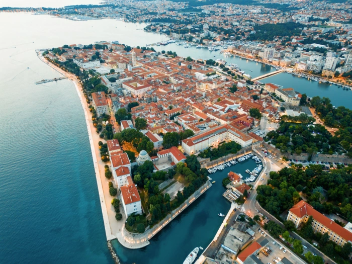 aerial-drone-view-zadar-sunset-croatia-historical-city-centre-with-old-buildings (1)