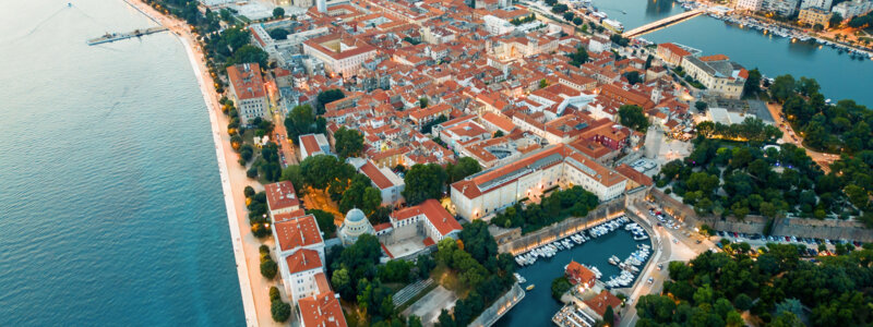 aerial-drone-view-zadar-sunset-croatia-historical-city-centre-with-old-buildings (1)